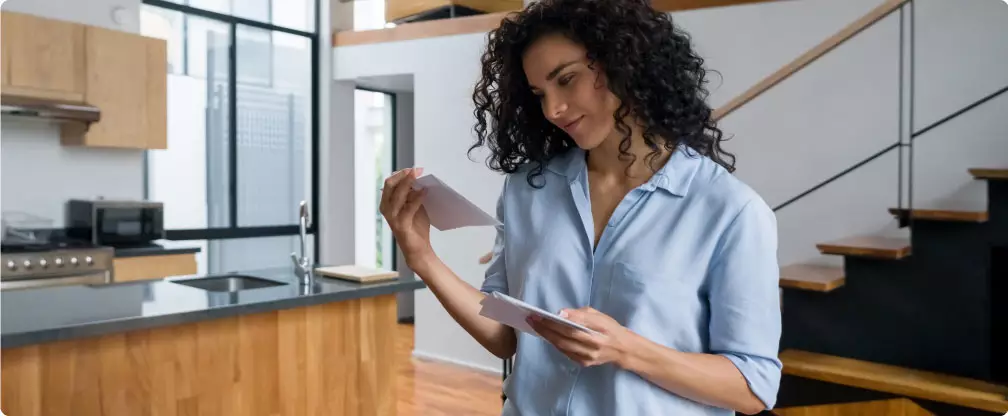 Woman looking at her mail