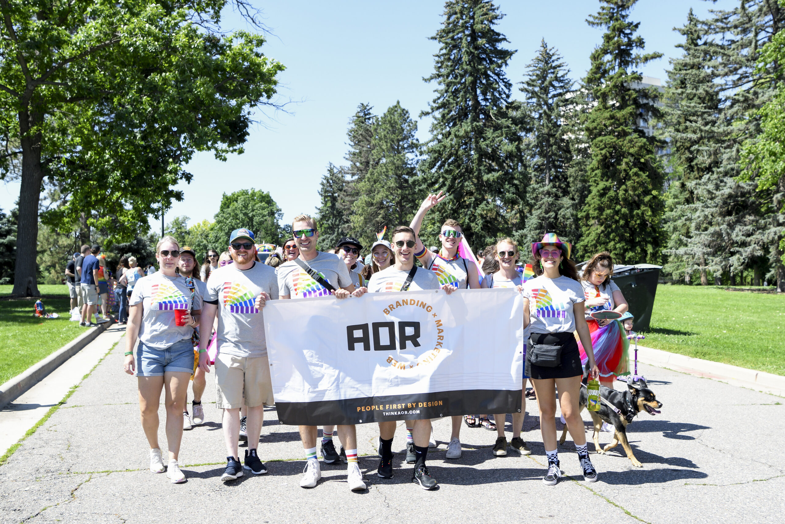 the team marching at a pride parage