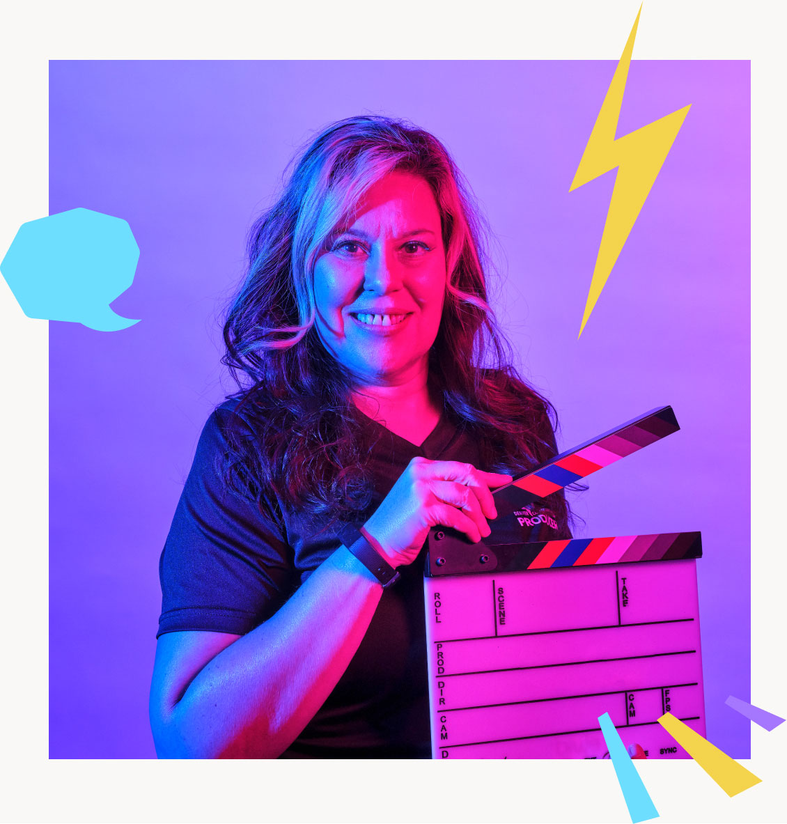 women holding directors clapper board
