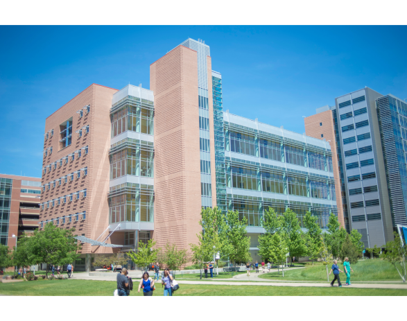 picture of an AEDC building with people walking around the campus